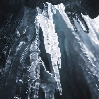 Huge icicle hanging down inside a gorge